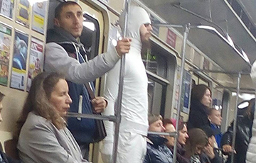 Photofact: Strange Man In White Walk In Minsk