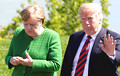 CBS: На саміце G7 Трамп кідаў цукеркі ў бок Мэркель