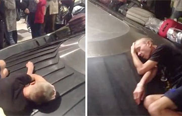 Відэагіт: Пасажыр заснуў на багажнай стужцы ў аэрапорце