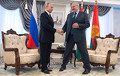 Фотафакт: Лукашэнка на сустрэчы з Пуціным ледзь не сеў на шпагат