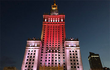 Palace Of Science And Culture In Warsaw Illuminated With White-Red-White Color Combination