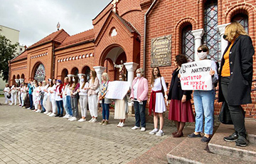 Belarusian Women Lined up in a Chain of Solidarity Near the Red Church