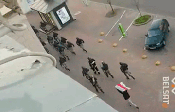 A Protester With a Flag Trolls Punishers