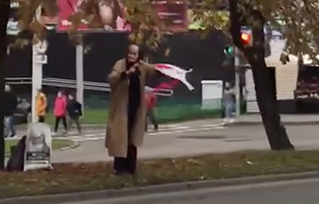 Very Old Lady Went Out To Protest With White-Red-White Ribbons In Minsk