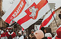 Белорусы Киева провели марш в память Михаила Жизневского