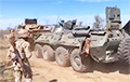 Брытанская бронемашына Wolfhound цягне трафейны расейскі БТР-82A