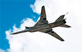 Российский Ту-22М3 догорает в поле после падения