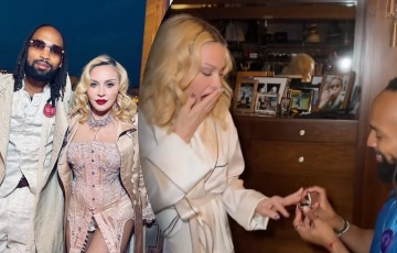 29-гадовы футбаліст стаў перад Мадоннай на адно калена