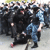 На митинге в Москве омоновец избил беременную девушку (Видео)