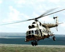 Mi-8 combat helicopter used against peaceful paraplanners