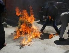 В Китае 40 человек сожгли себя, протестуя против выселения