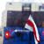 Троллейбус под бело-красно-белым флагом на улицах Витебска