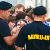 Riot policeman beats up 16-year old at Korn concert