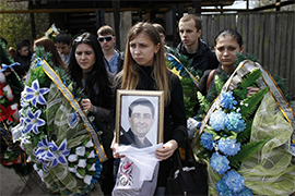 Убитого боевиками депутата похоронили в Горловке с воинскими почестями