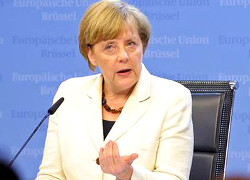 Меркель призвала Путина воздействовать на боевиков