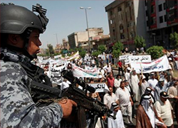 Премьер Ирака ввел войска в Багдад и требует суда над президентом
