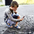 Новые реалии: дети в Донецке коллекционируют осколки от снарядов и играют в «блокпосты»