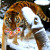 Тигрица научилась лепить снежные шары (Видео)