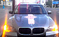 Traffic Police Stops A BMW X5 Decorated With National Ornamental Design And White-Red-White Flag