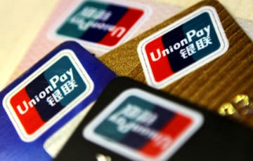 Крупнейшая в мире платежная система ограничила работу с банками РФ